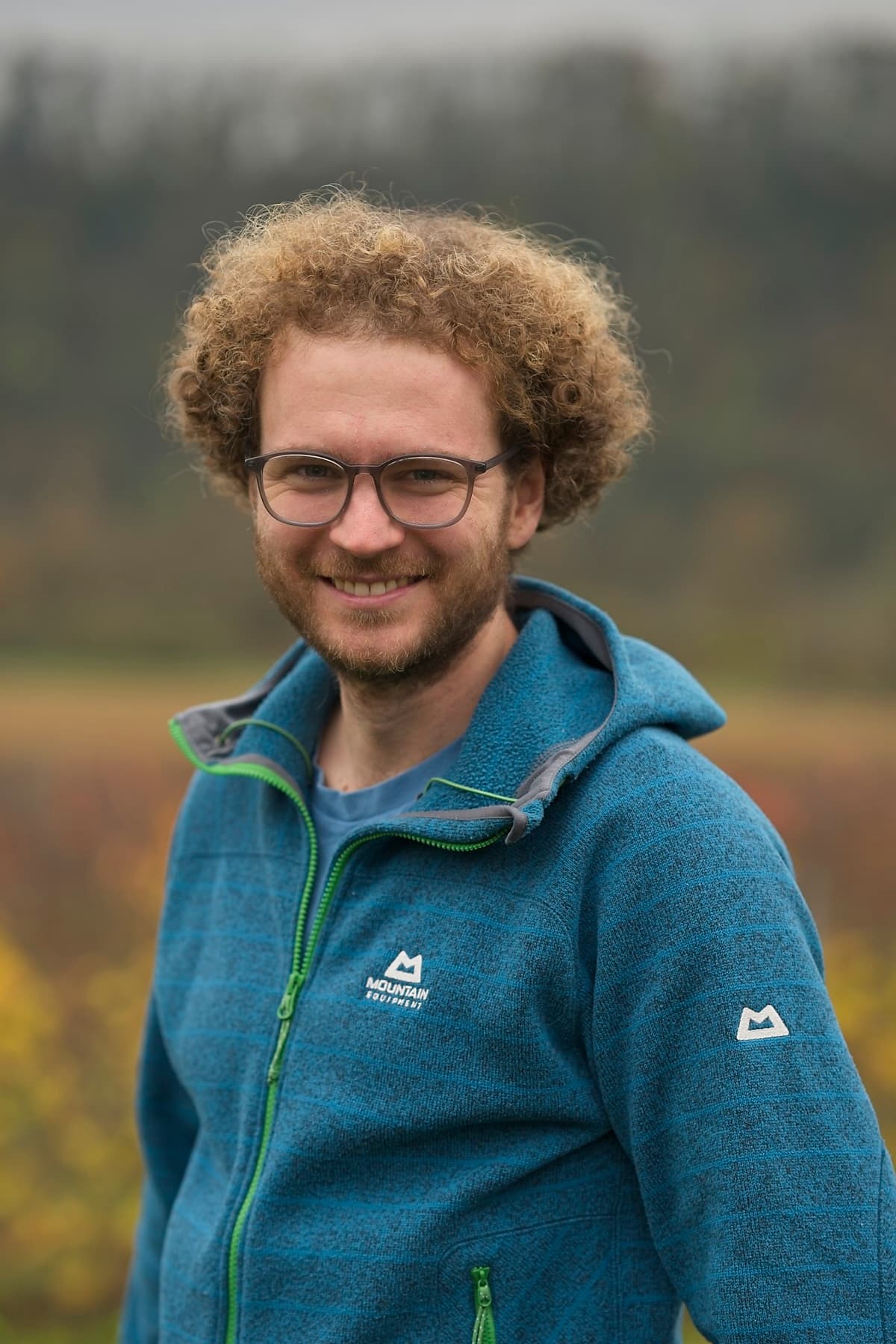 Pastor Andreas Winkler from GEC Heilbronn preaches on stage - passionate leader of the children's church.